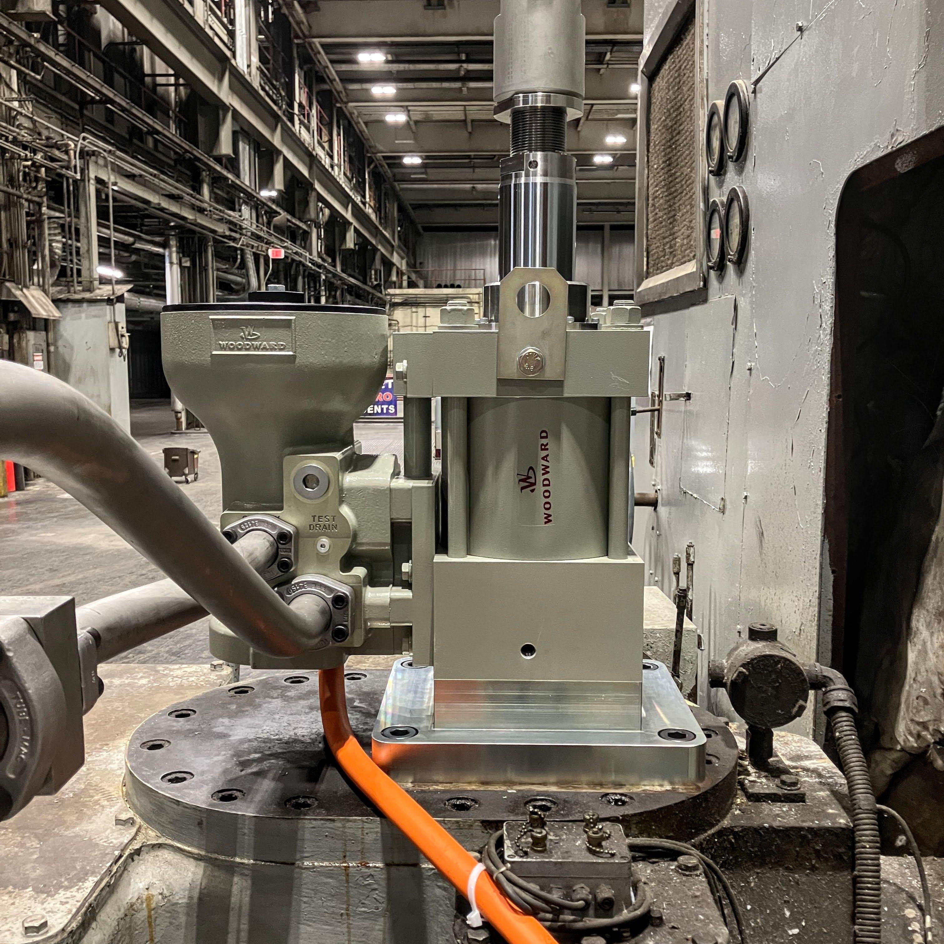 VariStroke-I actuator installed on a steam turbine. This prime mover generates electricity for industrial and commercial customers.